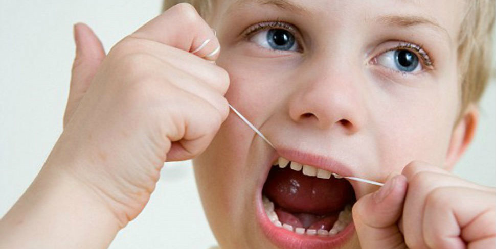 Make Flossing A Priority For Your Child
